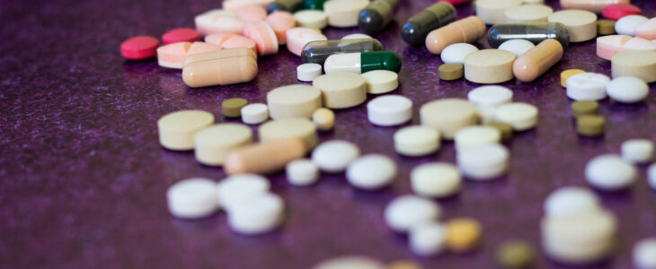 Heap of medicine pills. Close up of colorful tablets and capsules